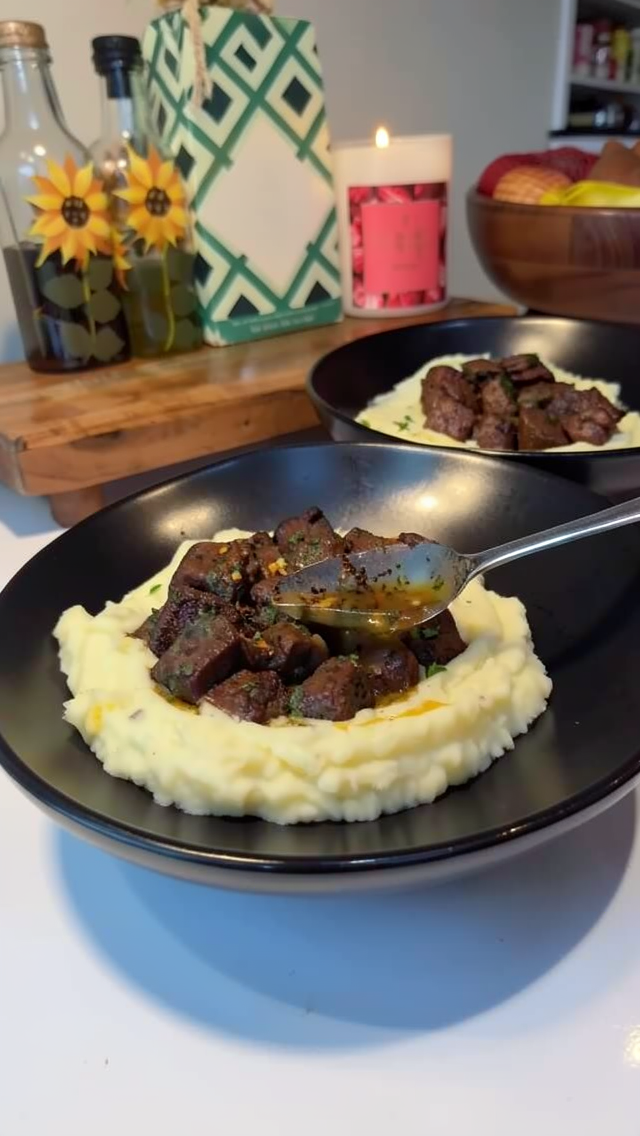 Easy Cajun Butter Steak Bites Over Parmesan Mashed Potatoes